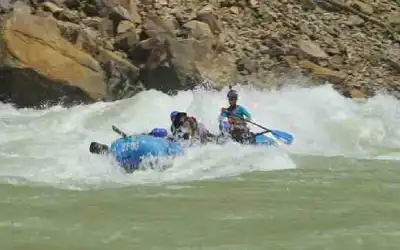 Visitors hitting Golf Course rapid during 16 KM rafting in Rishikesh