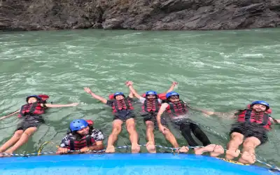 Rafters enjoying swimming in the Ganga River during their trip