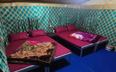 Luxury tents in Rishikesh with comfortable beds and clean sleeping space